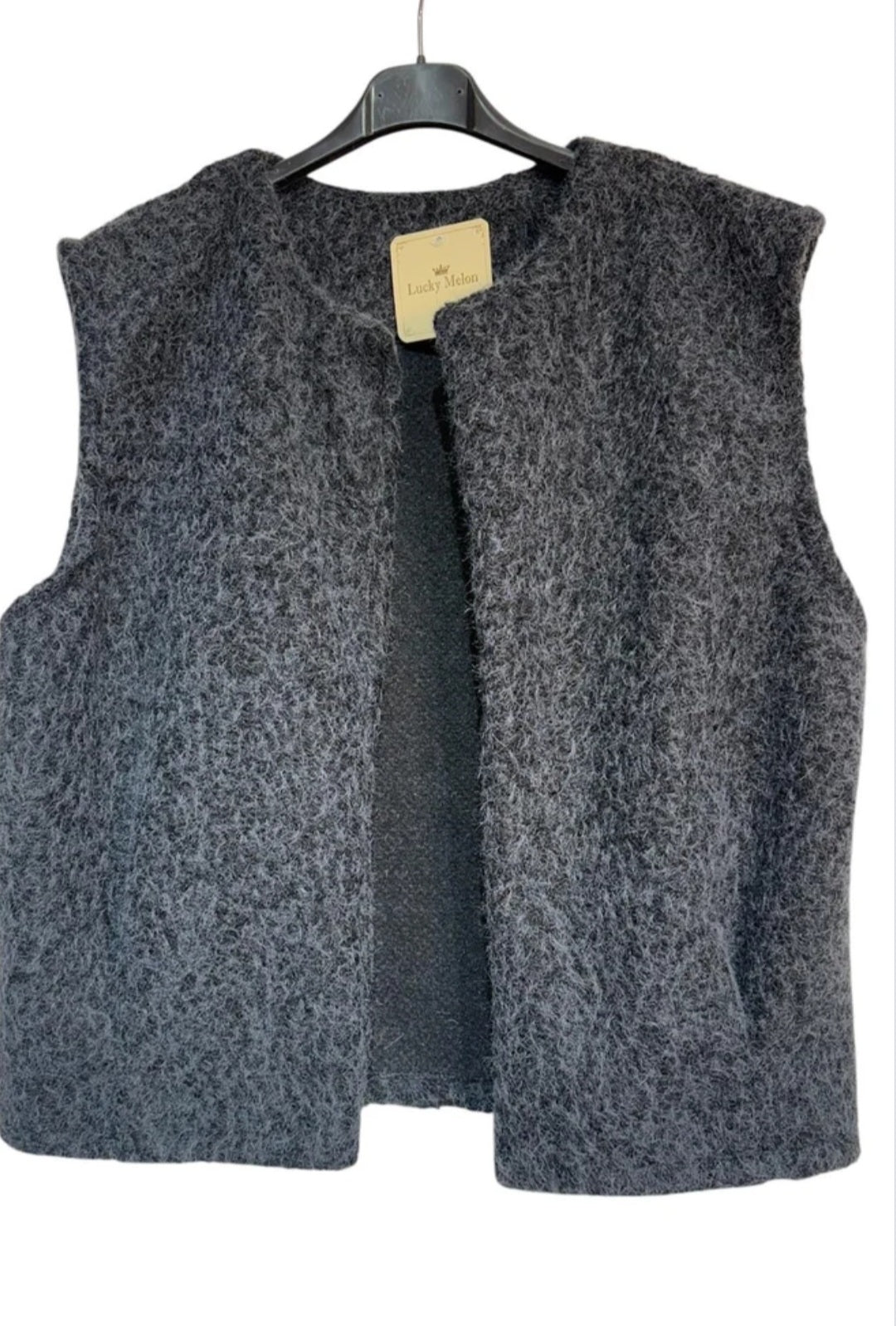 VESTE SANS MANCHE AVEC 2 POCHES